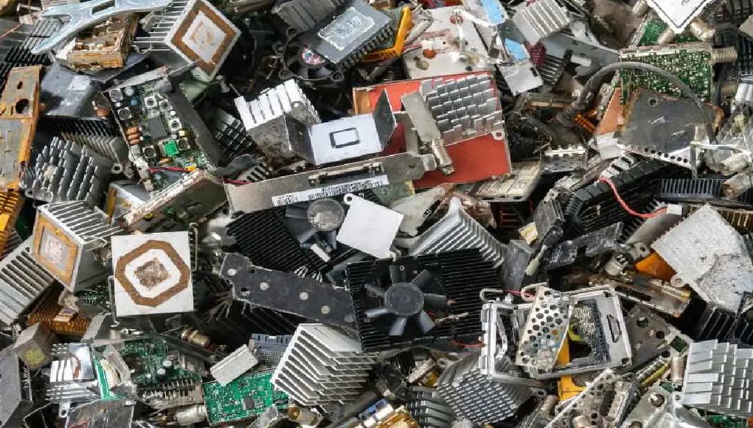 Circuit boards, heatsinks and IT parts ready for processing